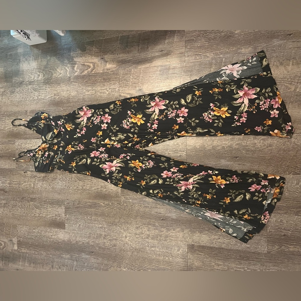 American eagle jumpsuit. Black with purple and yellow flowers.